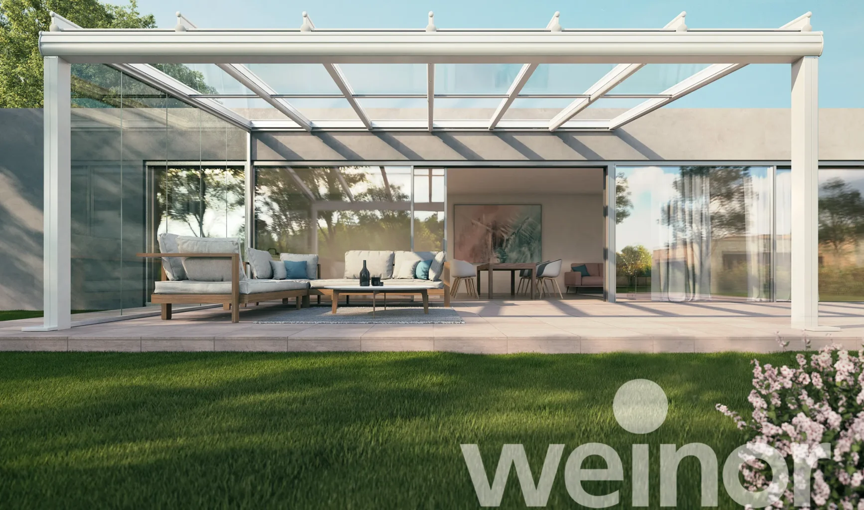 Das Glasdach Weinor Terrazza Originale ist in verschiedenen Farben verfügbar. Hier ist es ein weißes Gerüst vor einem grauen, modernen Gebäude.