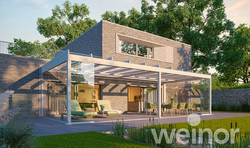 Das Glasdach Weinor Terrazza Pure bietet ästhetischen Mehrwert an modernen Fassaden und glänzt in seiner kubischen Formgebung.