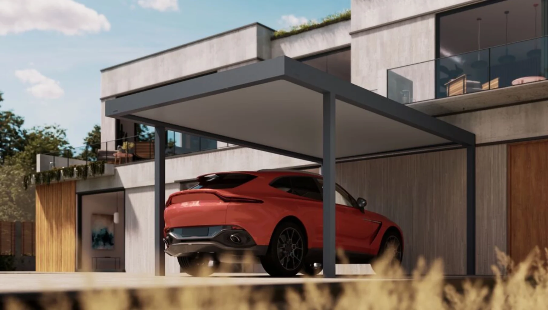 Ein rotes Auto parkt unter dem Carport Brustor B910 in dunkler Gestellfarbe bei Tag.